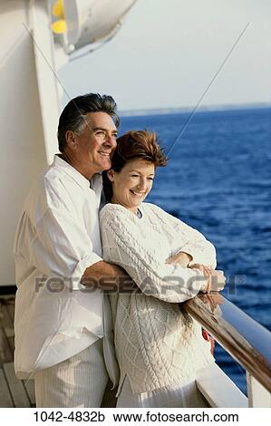 people, water, sea, couple, ship, sweater, standing View Large Photo Image Stock Image - people, water, sea, couple, ship, sweater, standing. Fotosearch