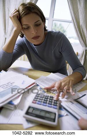 people, woman, calculator, adding, stress, contemplation, budget View Large Photo Image Stock Image - people, woman, calculator, adding, stress, contemplation, budget. Fotosearch