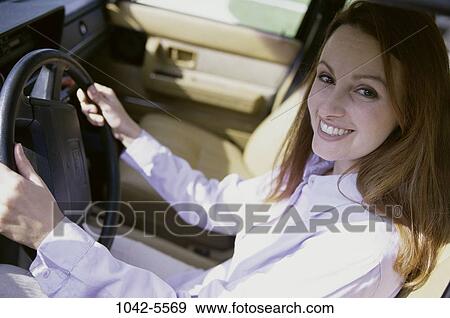 people, woman, car, driving, outdoors, transportation View Large Photo Image Stock Photo - people, woman, car, driving, outdoors, transportation. Fotosearch