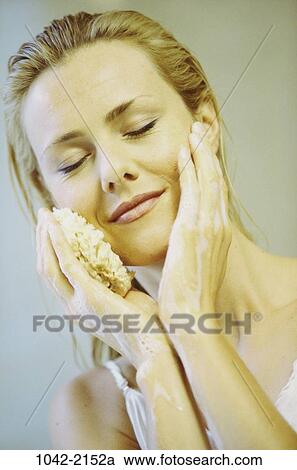 Stock Image - people, woman, face, bath, beauty, washing. Fotosearch