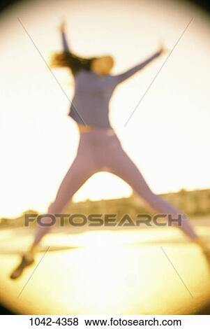 people, woman, jump, jumping, excitement, excited, Hispanic View Large Photo Image Stock Photo - people, woman, jump, jumping, excitement, excited, Hispanic. Fotosearch