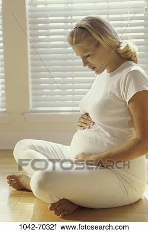 people, woman, pregnancy, young adult, Young women pregnant View Large Photo Image Stock Image - people, woman, pregnancy, young adult, Young women pregnant. Fotosearch