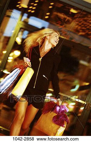 people, woman, rush, happy, motion, outdoors, joyous View Large Photo Image Stock Photo - people, woman, rush, happy, motion, outdoors, joyous. Fotosearch