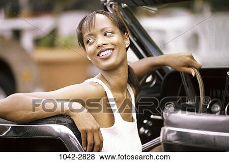 people, woman, smiling, car, driving, convertible, outdoors View Large Photo Image Stock Photo - people, woman, smiling, car, driving, convertible, outdoors. Fotosearch