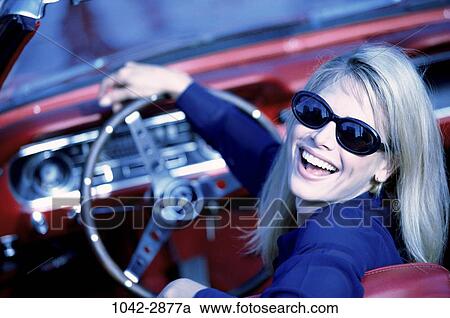 people, woman, smiling, car, convertible, sunglasses, outdoors View Large Photo Image Stock Image - people, woman, smiling, car, convertible, sunglasses, outdoors. Fotosearch