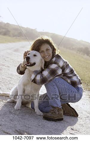 people, woman, smiling, dog, pet, outdoors, Middle-aged View Large Photo Image Stock Photo - people, woman, smiling, dog, pet, outdoors, Middle-aged. Fotosearch
