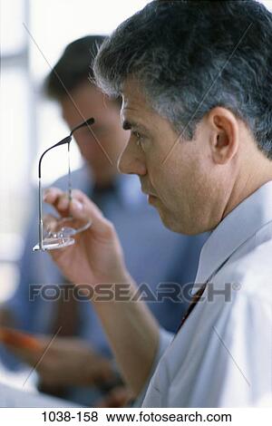 profile, eyeglasses, stress, business, Middle-aged, concern View Large Photo Image Stock Photo - profile, eyeglasses, stress, business, Middle-aged, concern. Fotosearch