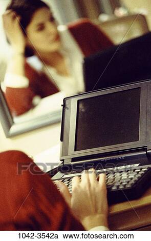 reflection, hotel, woman, mirror, business, computers, laptops View Large Photo Image Stock Image - reflection, hotel, woman, mirror, business, computers, laptops. Fotosearch