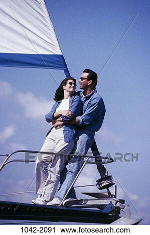 sky, people, smiling, couple, happy, sunglasses, leaning View Large Photo Image Stock Image - sky, people, smiling, couple, happy, sunglasses, leaning. Fotosearch