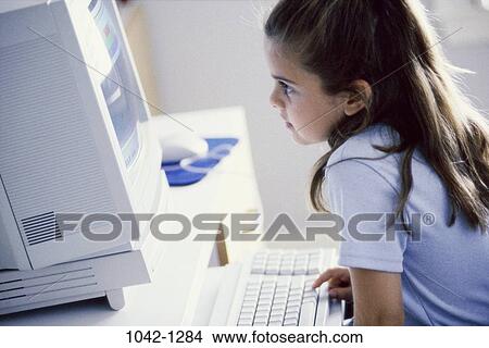 Picture - staring, choices, sitting, computer, reading, typing, girl. Fotosearch