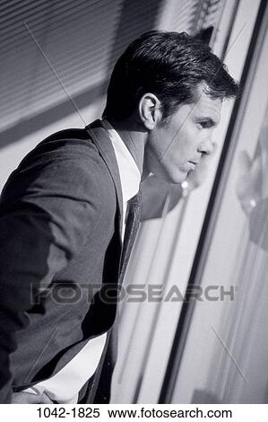 Stock Photography - staring, window, watch, business, watching, contemplation. Fotosearch
