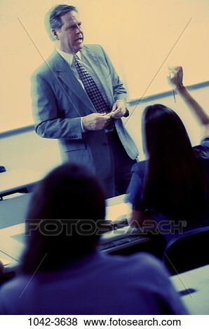 teacher, classroom, leadership, Middle-aged, education, learning View Large Photo Image Stock Photo - teacher, classroom, leadership, Middle-aged, education, learning. Fotosearch