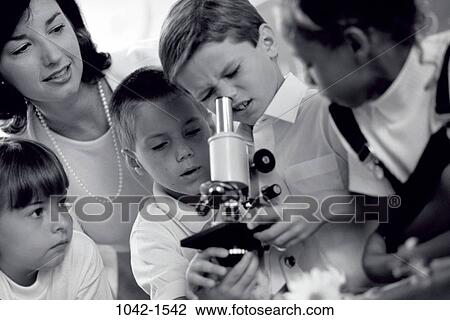 teacher, classroom, microscope, curious, children, education View Large Photo Image Stock Image - teacher, classroom, microscope, curious, children, education. Fotosearch