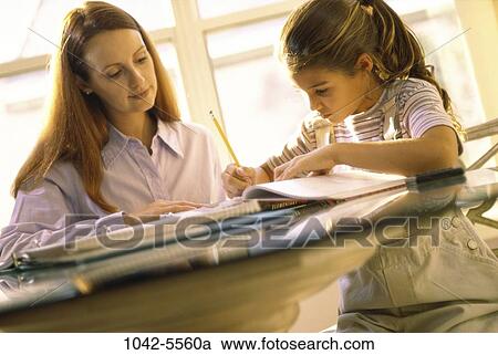 teacher, mother, homework, studying, writing, family View Large Photo Image Stock Image - teacher, mother, homework, studying, writing, family. Fotosearch