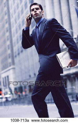 Stock Image - telephone, newspaper, rush, phone, stress, business. Fotosearch
