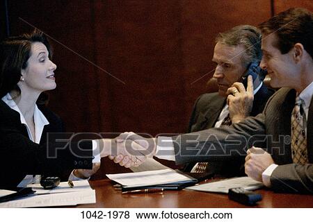 Stock Photo - telephone, phone, business, Middle-aged, teamwork, commitment, executives. Fotosearch
