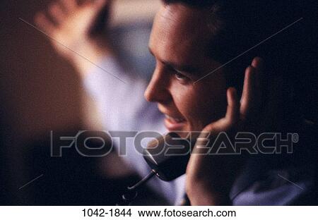 Picture - telephone, talking, conversation, phone, gesturing, business. Fotosearch