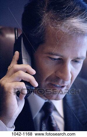 telephone, talking, phone, business, Middle-aged, serious View Large Photo Image Stock Photo - telephone, talking, phone, business, Middle-aged, serious. Fotosearch