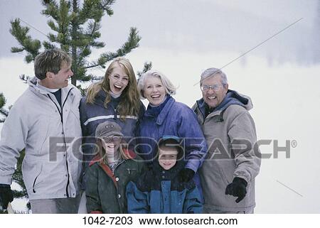 Stock Image - tree, people, snow, winter, three, outdoors. Fotosearch