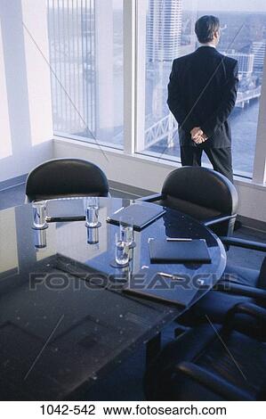 Stock Image - window, business, contemplation, anticipation, contemplating, waiting. Fotosearch