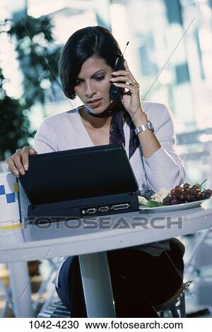 woman, busy, Hispanic, laptop, phone, watch, business View Large Photo Image Stock Image - woman, busy, Hispanic, laptop, phone, watch, business. Fotosearch