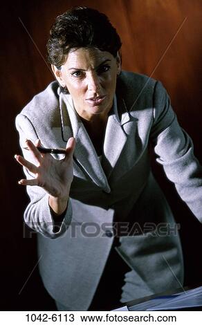 woman, gesturing, business, confrontation, serious, professional, brunette View Large Photo Image Stock Image - woman, gesturing, business, confrontation, serious, professional, brunette. Fotosearch