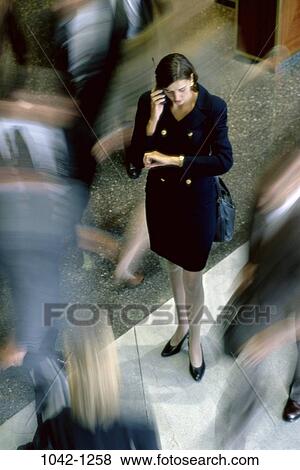 woman, telephone, phone, business, outdoors, cell phone, individuals View Large Photo Image Stock Photo - woman, telephone, phone, business, outdoors, cell phone, individuals. Fotosearch