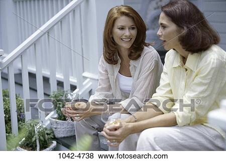 women, people, discussion, conversation, friendship, drinking View Large Photo Image Stock Photo - women, people, discussion, conversation, friendship, drinking. Fotosearch