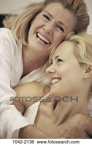 women, people, smiling, mother, happy, laughing, hugging View Large Photo Image Stock Photograph - women, people, smiling, mother, happy, laughing, hugging. Fotosearch