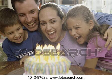 celebration, cake, birthday, laughing, joyous, family View Large Photo Image Stock Image - celebration, cake, birthday, laughing, joyous, family. Fotosearch