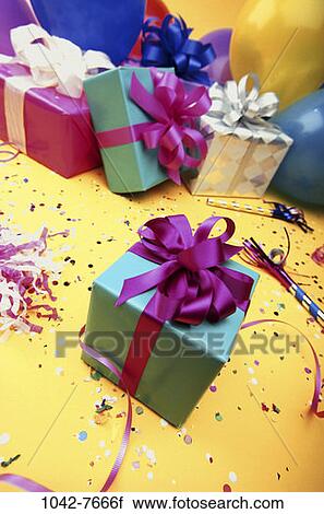 Stock Image - , celebration, wrapped, balloons, festive, confetti, streamers. Fotosearch