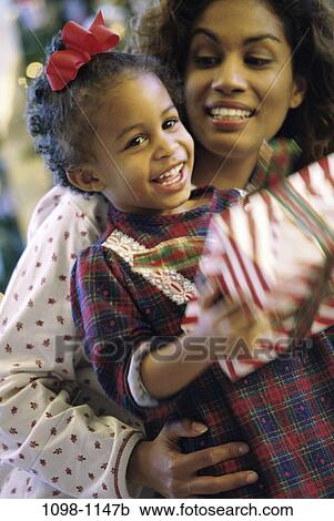 Christmas, family, holiday, Christmas families View Large Photo Image Stock Image - Christmas, family, holiday, Christmas families. Fotosearch