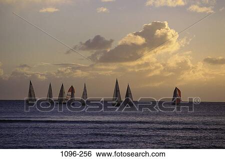 clouds, ocean, sunset, boating, sports, water sports View Large Photo Image Stock Photograph - clouds, ocean, sunset, boating, sports, water sports. Fotosearch