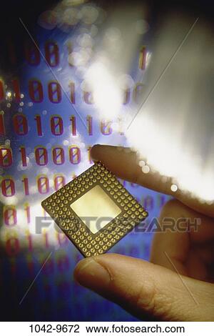Stock Image - computer, still life, fiber optics, components, parts, microchip, binary codes. Fotosearch