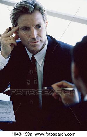 consultation, discussion, business, serious, businessman, indoors View Large Photo Image Stock Image - consultation, discussion, business, serious, businessman, indoors. Fotosearch