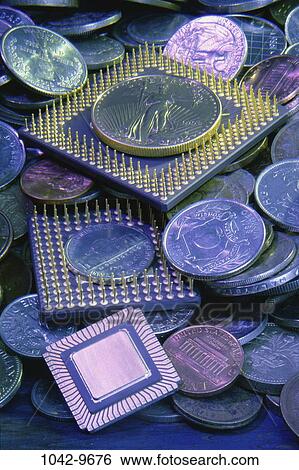 contrast, finance, still life, components, parts, microchips, coins View Large Photo Image Stock Photograph - contrast, finance, still life, components, parts, microchips, coins. Fotosearch