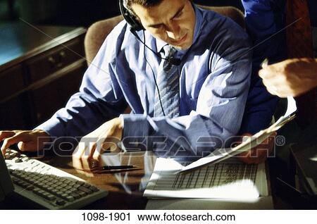 desk, headset, telephone, busy, computer, reading View Large Photo Image Stock Image - desk, headset, telephone, busy, computer, reading. Fotosearch