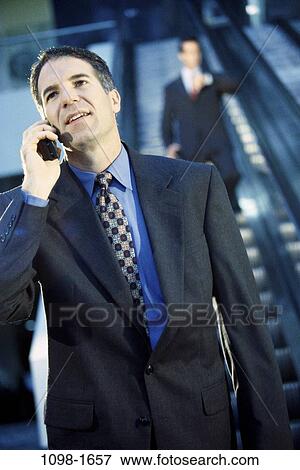 escalator, telephone, talking, conversation, phone, business View Large Photo Image Stock Photo - escalator, telephone, talking, conversation, phone, business. Fotosearch