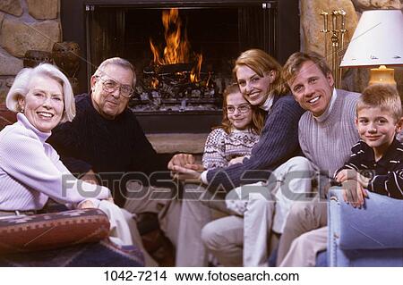 fire, people, sitting, fireplace, family, gathering, generations View Large Photo Image Picture - fire, people, sitting, fireplace, family, gathering, generations. Fotosearch