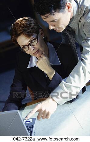 group, desk, eyeglasses, laptop, pointing, business, point View Large Photo Image Stock Image - group, desk, eyeglasses, laptop, pointing, business, point. Fotosearch