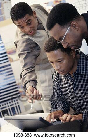 Stock Photo - group, men, discussion, computer, pointing, business, concepts. Fotosearch