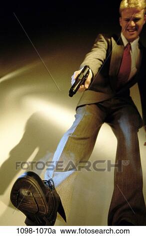 gun, mistake, business, risk, blond, humor, pain View Large Photo Image Stock Image - gun, mistake, business, risk, blond, humor, pain. Fotosearch
