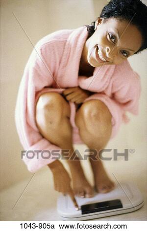 home, woman, smiling, diet, health, achievement, weight View Large Photo Image Stock Image - home, woman, smiling, diet, health, achievement, weight. Fotosearch