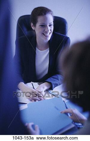 meeting, desk, woman, consultation, business, brunette View Large Photo Image Stock Image - meeting, desk, woman, consultation, business, brunette. Fotosearch