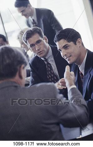 Stock Image - meeting, group, conference, business, businesspeople, Businesspeople conferring. Fotosearch