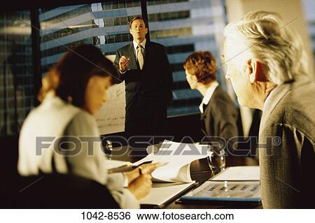 meeting, group, multiethnic, formal, talking, presentation, listening View Large Photo Image Stock Photograph - meeting, group, multiethnic, formal, talking, presentation, listening. Fotosearch