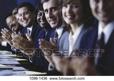 meeting, group, multiethnic, smiling, table, clapping View Large Photo Image Stock Photograph - meeting, group, multiethnic, smiling, table, clapping. Fotosearch