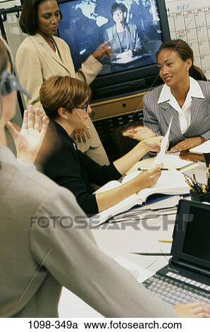 meeting, group, multiethnic, women, headset, talking, discussion View Large Photo Image Stock Image - meeting, group, multiethnic, women, headset, talking, discussion. Fotosearch