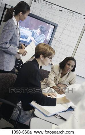 meeting, group, multiethnic, women, paperwork, discussion, presentation View Large Photo Image Stock Image - meeting, group, multiethnic, women, paperwork, discussion, presentation. Fotosearch