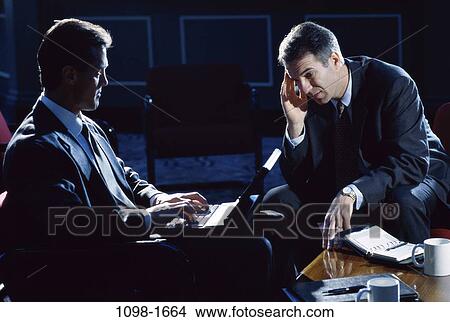 meeting, men, headache, consultation, talking, listening View Large Photo Image Picture - meeting, men, headache, consultation, talking, listening. Fotosearch